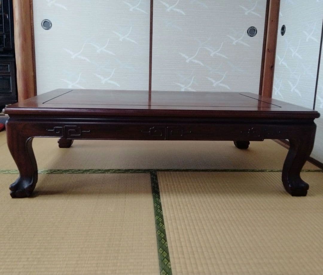 Low table (likely rosewood)